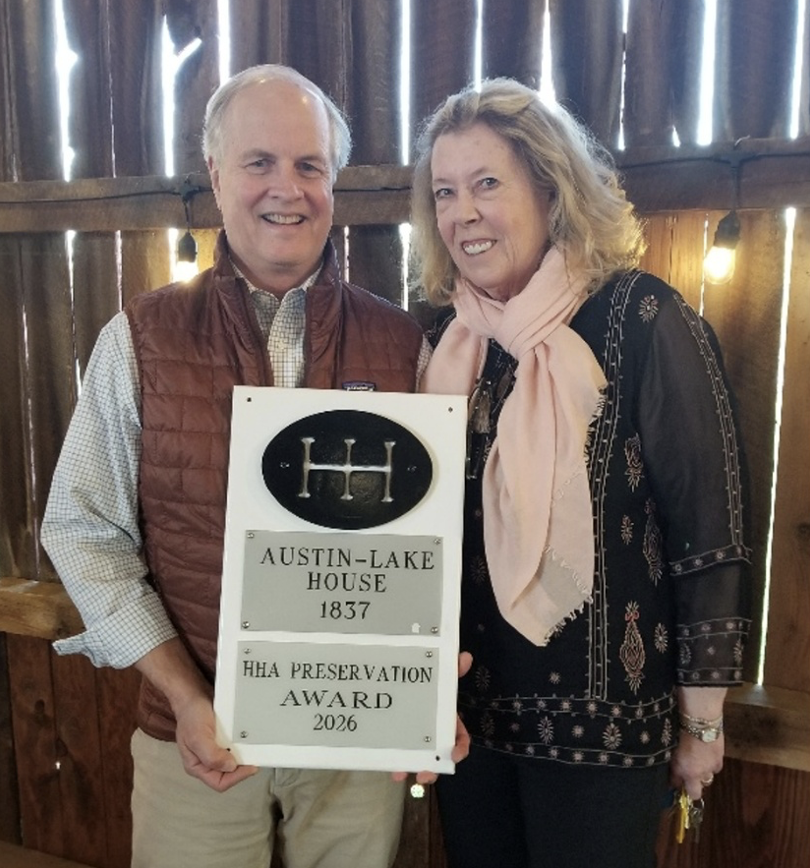 Russ and Karyl Morrison accept the HHA Preservation Award for the work done to restore the Austin-Lake House.